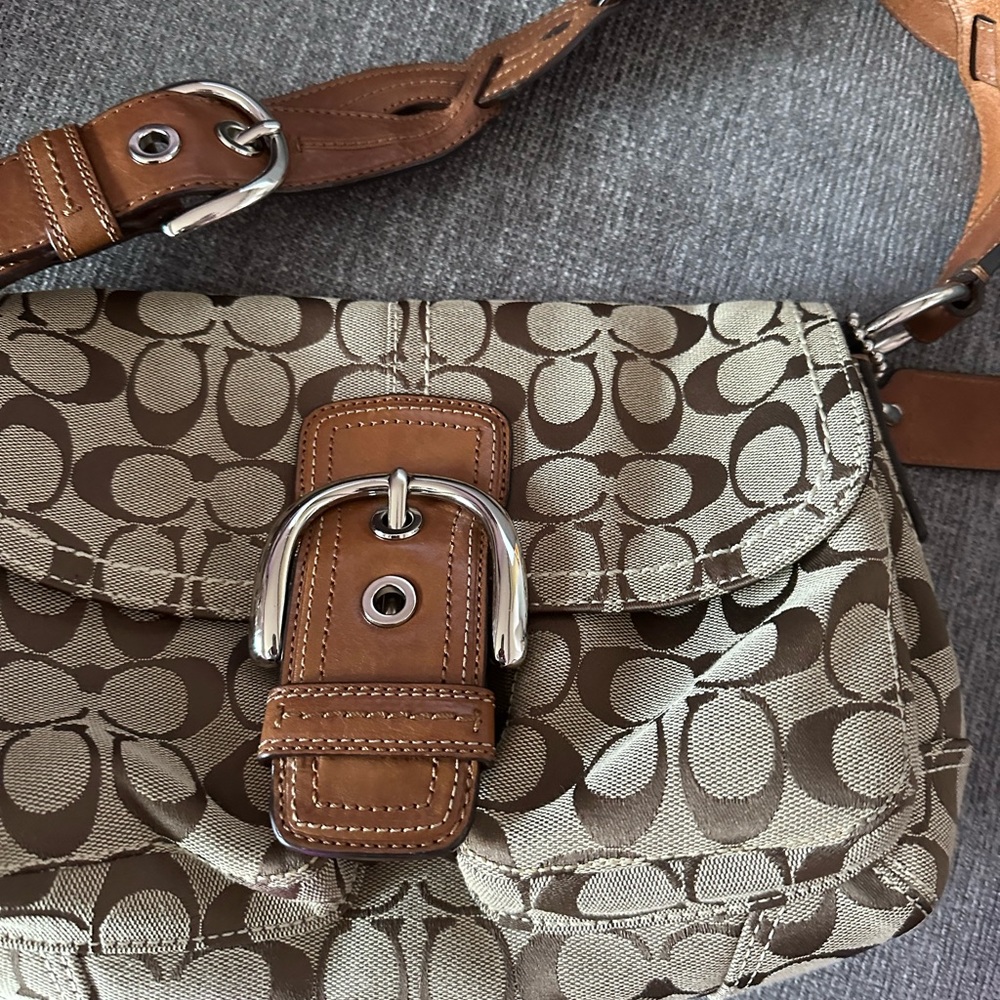Vintage Hobo Coach bag. Great condition. Nice leather buckle and strap.